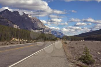 Royalty Free Photo of a Highway By the Rocky Mountains