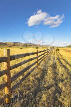 Royalty Free Photo of a Fence on an American Farm