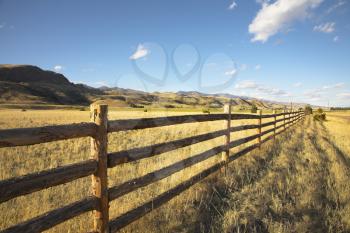 Royalty Free Photo of a Fence on an American Farm