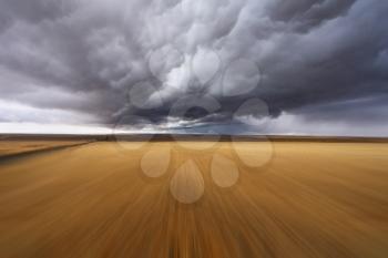 Royalty Free Photo of Thunderclouds in a Field in Montana