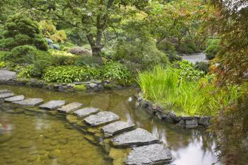 Royalty Free Photo of a Footpath Through a Japanese Pond