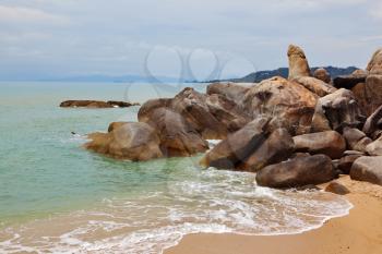 The picturesque pile of stones Grandma and Grandpa on the coast of the Gulf of Thailand. Lamai Beach, Samui Island