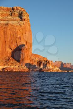 Travel voyage by boat on Lake Powell.  Scenic wave at the stern of the ship. Arizona, USA. Sunset