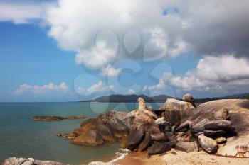 The Thai island Samui. A picturesque heap of rocks on the seacoast, shined with the sunset
