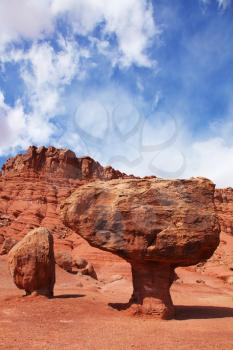 Giant stone mushroom effect of weathering in the red desert of the Colorado River Valley