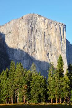 The well-known rocky monolith Al-Capitan in Yosemite national park on a sunset