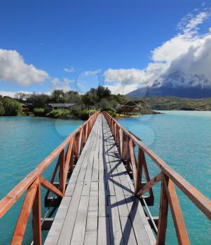 National Park Chile - Torres del Paine. Easy Bridge at Lake Pehoe connects the island and the shore of Lake
