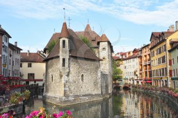 The picturesque medieval prison in the old French resort town of Annecy. Today it is a museum. The building looks great in the middle of a large city canal