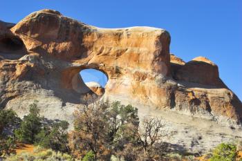  Natural hills of unusual forms from sandstone and through arches in park Arches 