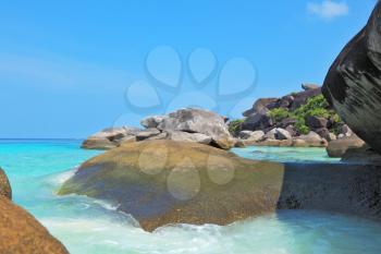  Finest white sand beach between huge black cliffs and azure water. Similan Islands, Andaman Sea, Thailand