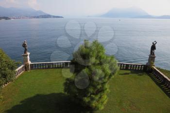 Terrace, adorned with sculptures, on the waterfront. Park on the island of Isola Bella on Lake Maggiore