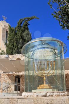 Large gold-plated menorah. Exhibited in Jerusalem in a huge glass cover