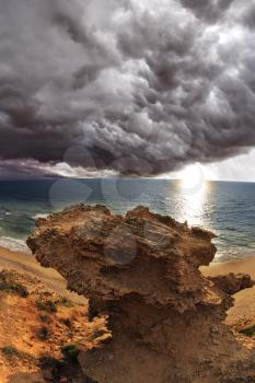 Huge thundercloud above Mediterranean sea. A sunset