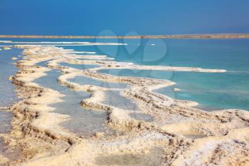  The picturesque path from the evaporated salt in the Dead Sea. Salt formed long paths with scalloped edges. Israel in October