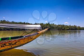 Travel in the native boat  Longtail in the spring. Marshy channels and mangrove thickets in Thailand