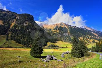 Early autumn in the Austrian Alps. The beautiful sunny day in the national park Grossgloknershtrasse