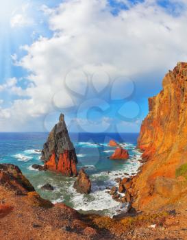 Eastern tip of the island of Madeira in the Atlantic Ocean. Pinnacles covered sunset