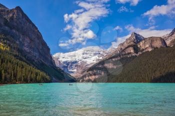 Banff National Park, Canada, Alberta. Magnificent Lake Louise with emerald green water surrounded by the Rocky Mountains and glaciers