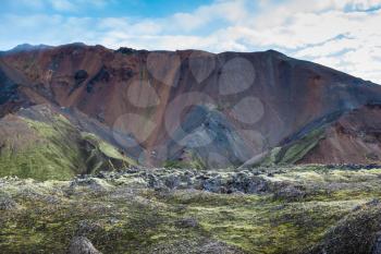 The picturesque valley surrounded by rhyolite mountains. Summer morning in the National Park Landmannalaugar, Iceland
