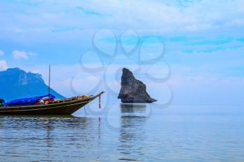  Spring trip to native boat Longtail. Morning mist on the Andaman Sea, Thailand