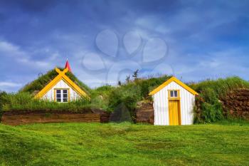 The village of ancestors in Iceland. The recreated village -  museum of pioneers - Vikings. Houses are roofed by the turf