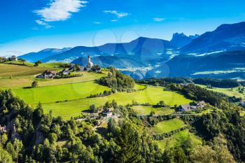  Lovely little village in the Dolomites. Magnificent Tyrol. Journey to a magical fairy-tale country. The concept of ecological and ethnographic tourism