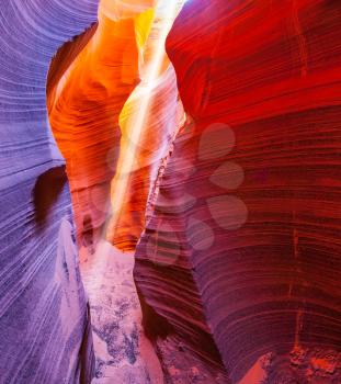  The Navajo reservation in Arizona, USA. Famous midday sun ray in  slot canyon Antelope