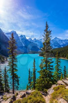 Canadian Rockies, Province of Alberta. Lake Moraine with emerald water in the Valley of the Ten Peaks. The concept of ecological, photographic and active tourism