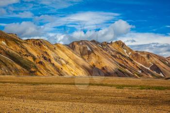 The valley of national park Landmannalaugar in warm sunlight of July. Magnificent Iceland in the summer