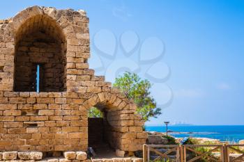  Ruins of ancient defensive walls and urban facilities. National park Caesarea on the Mediterranean. Israel