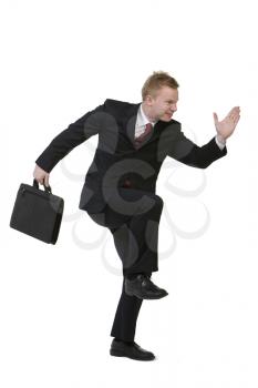 Royalty Free Photo of a Businessman Miming Running