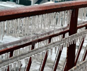 Metal bars with icicles