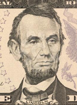 Royalty Free Photo of Abraham Lincoln on 5 Dollars 2006 Banknote from U.S.A. 16th President of the United States from March 1861 until his assassination in April 1865.