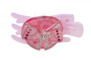 Pink hairclip in the shape of a butterfly on white background, isolated