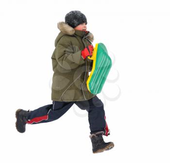 Winter games children - boy, running with sleds, isolated