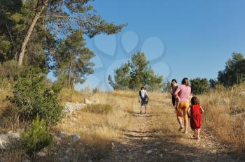 Royalty Free Photo of People Walking on a Country Lane