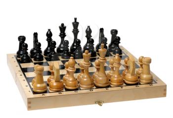 Royalty Free Photo of a Chess Board With Wooden Pieces