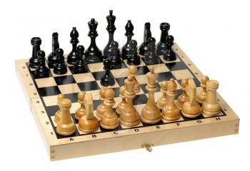 Royalty Free Photo of a Chess Board With Wooden Pieces