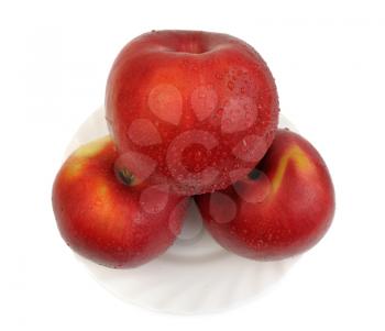Royalty Free Photo of a Red Apples on a White Plate