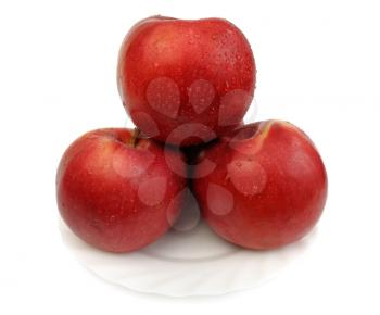 Royalty Free Photo of Red Apples on a White Plate