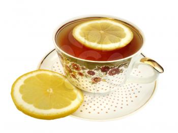 A cup of tea and slices of lemon on a white background, isolated
