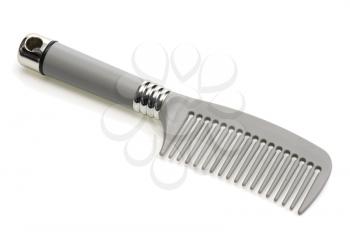 Royalty Free Photo of a Grey Comb on a White Background