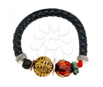 Bracelet woven from black leather straps, isolated