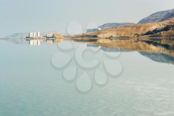 Royalty Free Photo of Early Morning on the Dead Sea and Buildings in the Background