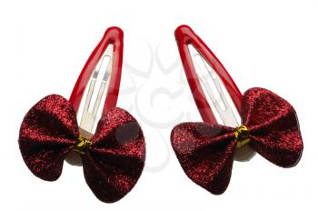 Two red hairclips, isolated on a white background