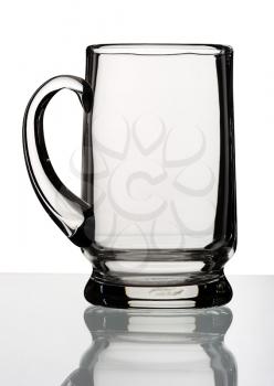 Glass mug for beer on a white background, isolated