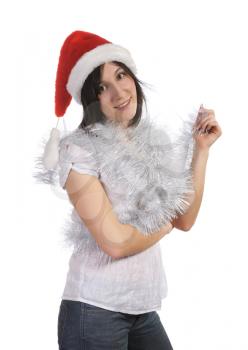 Royalty Free Photo of a Girl Wearing a Santa Hat