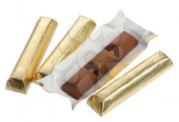 Bars of chocolate in gold foil, isolated on a white background
