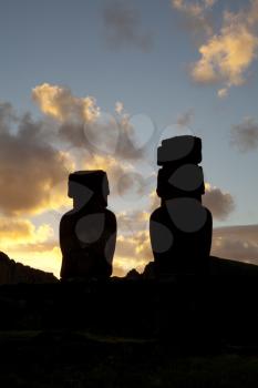 Royalty Free Photo of Statues on Easter Island in Silhouette