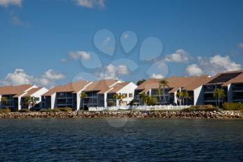 Resort Houses On The Beach Under Blue Sky